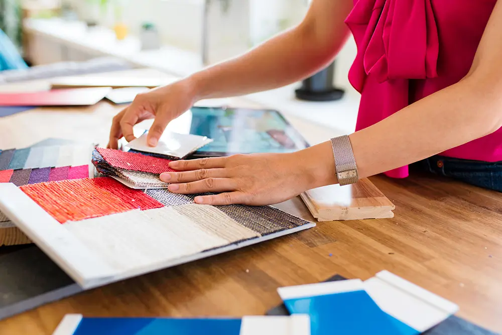Designer looking at color swatches