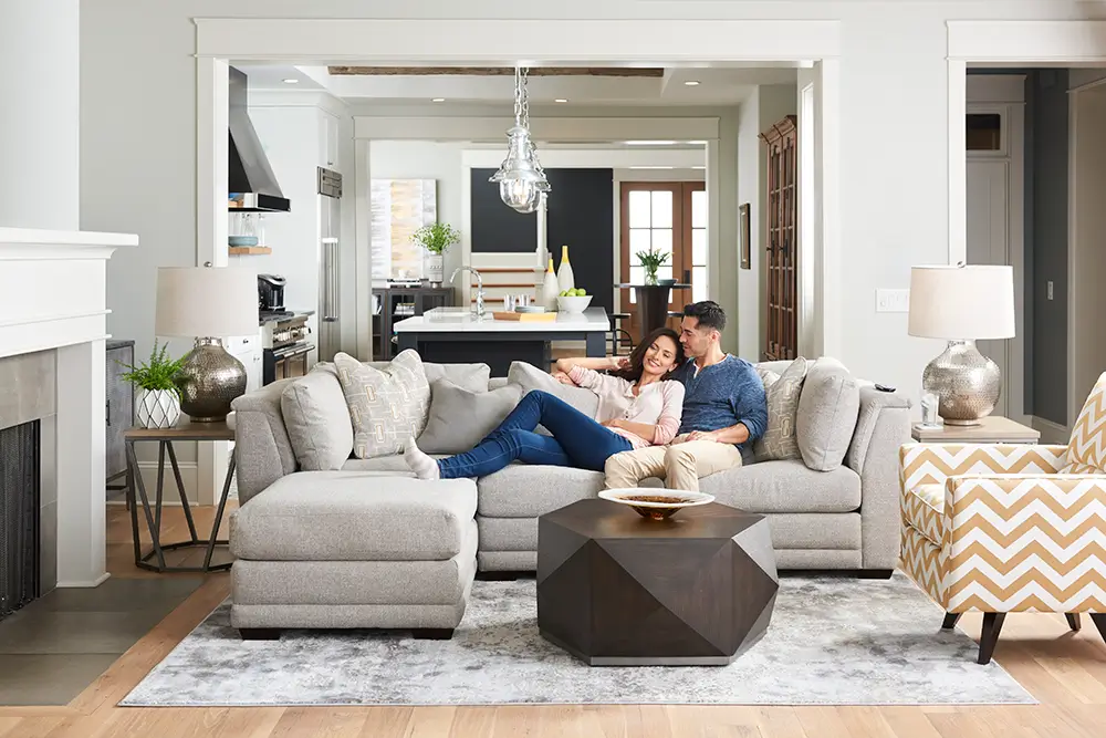 Couple relaxing in living room