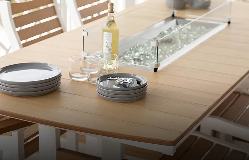 Outdoor table with fire pit